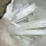 Scolecite Spray in Quartz Geode
